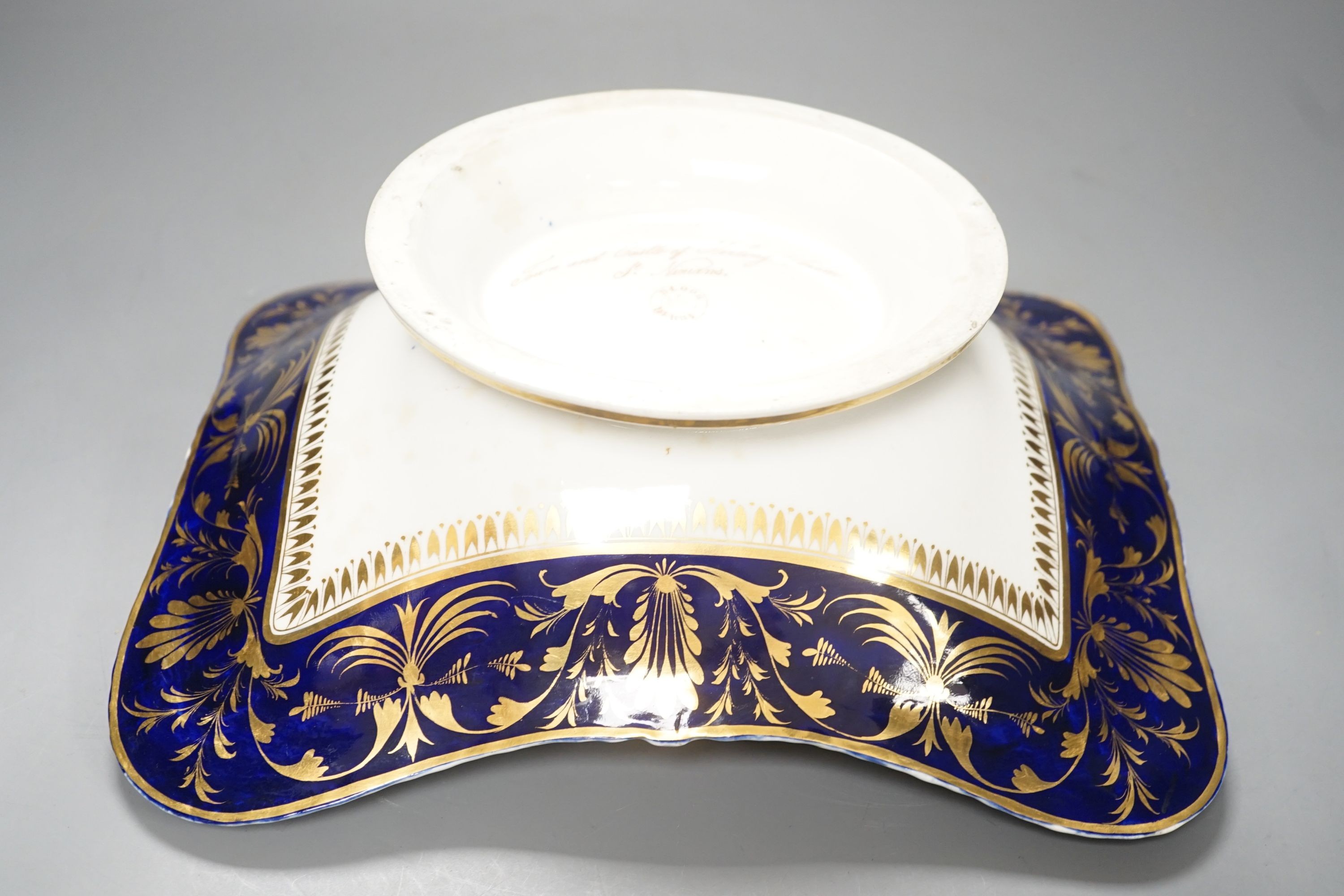 A Derby two handled pedestal dish with a named view of Sterling Castle, under a blue and gilt border probably by Daniel Lucas, c.1815, width 29cm